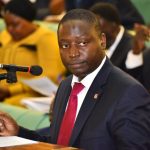 The Finance Minister has tabled a proposal to borrow 1.7 trillion shillings , (449.8) million dollars to mitigate the effect of the Coronavirus (COVID -19) pandemic which has slowed down the economy. The Proposal was presented today during plenary by the Minister of Finance in Charge of Planning, David Bahati. Government will borrow 757 Billion Uganda shillings for this financial year ending and next financial year from the International Development Association (IDA) of the World Bank Group to provide sufficient financial resources to the health sector and mitigate negative effects on the economy due to COVID-19. The government also seeks to borrow 948 Billion shillings from the International Monetary Fund (IMF) for balance of payments support to the Bank of Uganda (BoU). This is to ensure that international reserve buffers remain strong and that the exchange rate remains stable. Rebecca Kadaga, the Speaker of Parliament forwarded the two proposals to the Parliamentary committee on budget to scrutinize it urgently. Recently when presenting the likely economic impact of the Coronavirus, the Finance Minister Matia Kasaija told MPs that Uganda faces a revenue shortfall of 270 Billion shillings due to the lock down. “To deal with this economic shock, both fiscal and monetary policy adjustments would be required. The fiscal policies will play a critical role in mitigating the negative impact of the pandemic on economic activity and the challenges in the affected sectors particularly health, while monetary policies will help to reduce the impact of the deterioration of the Balance of Payments.” said Kasaija. He also said that 80,000 Ugandans are mostly likely to be pushed into poverty due to the low activity in the service and industry areas, and this will lead to a decline in economic growth. The economic growth for the country for financial year 2019/2020 has been revised downwards from 6.0% to 5.2% or 5.7% depending on the severity of the impact of the virus in Uganda.