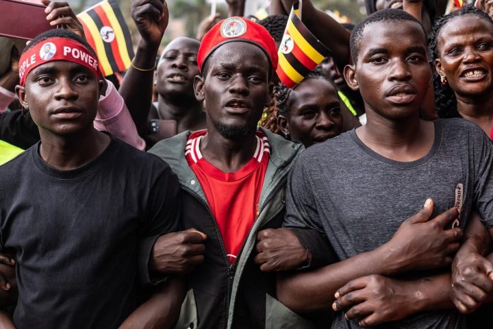 A dark smartphone screen displaying a "No Internet Connection" alert over the Ugandan flag.