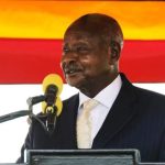Ugandan President Yoweri Museveni waving to supporters at a campaign rally in rural Uganda